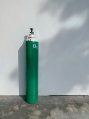 green mobile cylinder oxygen tank, medical equipment for hospital used,  treatment aid in...