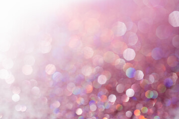 Abstract sequin background with shining festive bokeh.