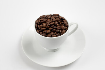 Coffee beans in white glass, white background