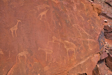 Site of ancient petroglyphs. Carved with giraffes, horses and other animals.