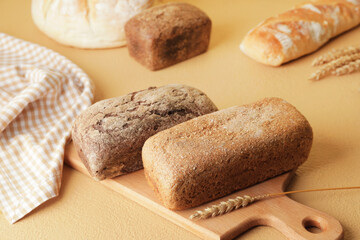 Fresh bread on color background