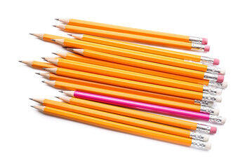 Obraz premium Pink pencil among orange ones on white background. Concept of uniqueness