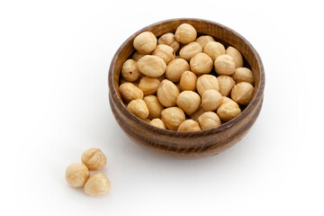 Nuts in wooden bowl. Delicious snack.