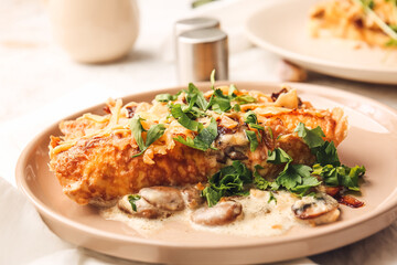 Plate with piece of delicious casserole with minced meat on table