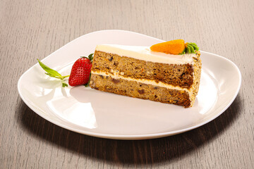 Carrot cake slice with cream