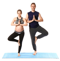 Obraz premium Young pregnant woman and her husband practicing yoga on white background