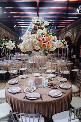 decor of fresh flowers in the restaurant for a wedding banquet.