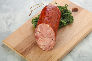 Pork ham sausage over board