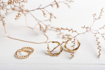 Stylish accessories on light wooden background