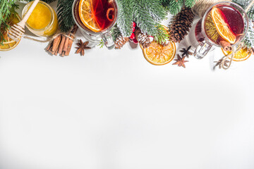 Mulled wine, traditional hot winter autumn alcohol boozy drink, with cinnamon, anise and orange, On...