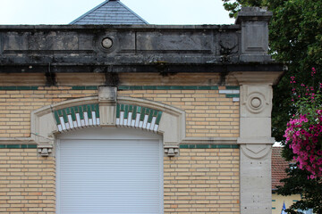 Fototapeta na wymiar brick building (house ?) in vittel in lorraine (france)