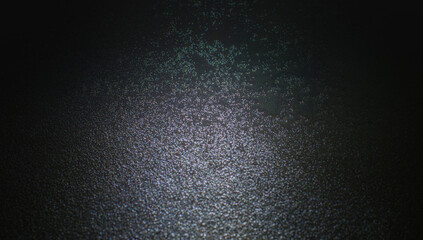 Blurred image of abstract pattern black background with shining light and shadow.