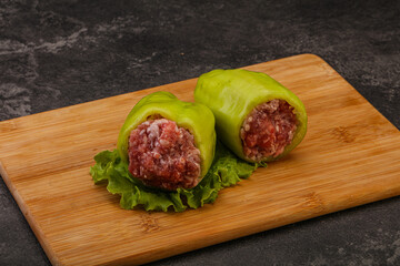Raw stuffed pepper for cooking