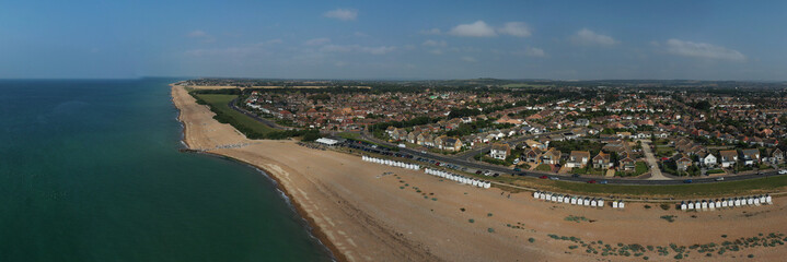 Goring by Sea beach with the popular Cafe and the greensward in view behind the beach at this...