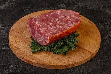 Beef ham piece over board