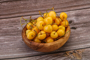 Sweet ripe yellow cherry heap