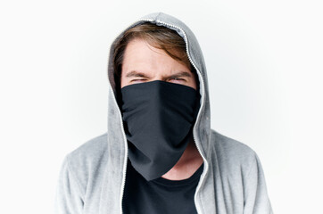 man with a hood on his head anonymity theft crime