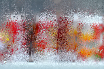 Water droplets on the glass of the drink refrigerator