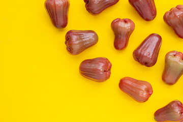 Rose apple on yellow background