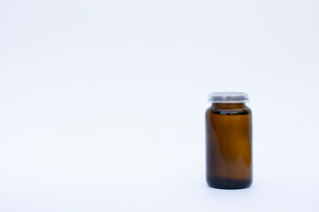 brown bottle in white backgrounds with free copy space