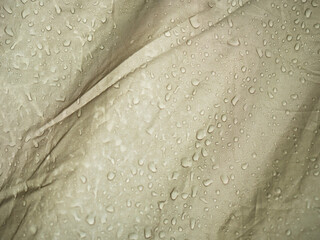 Water repellented fabric with raindrops of hiking tent.
