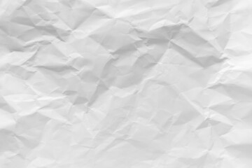 White crumpled paper texture background.