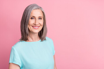 Photo of funky elder grey hairdo lady wear blue blouse isolated on pink color background