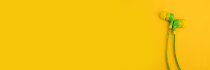 headphones on the yellow backgrounds.