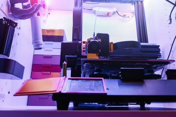 3D printer with neon lights. View from above