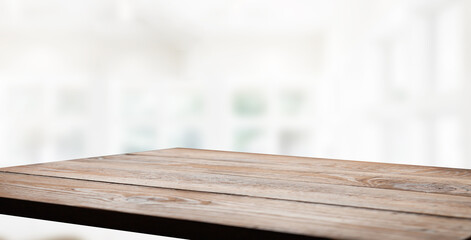 blurred light window background with table