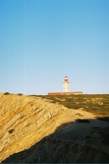 lighthouse on the coast. light house on the shore of a portugal cliff