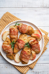 Bacon wrapped turkey or chicken breast with apple slice