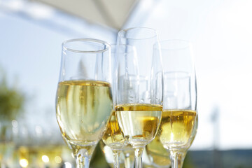 two glasses of champagne on the table