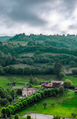 Vertical shot of an uninhabited church and castle in northern Spain