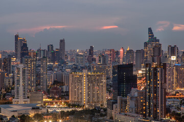 Bangkok, thailand - May 08, 2020 : Scenic view of the modern Bangkok with skyscrapers in the business district at during sunset. Selective focus.