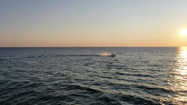 Water  scooter on the sea at sunset 2