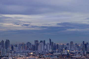 Obraz premium Bangkok, thailand - May 11, 2020 : Sky view of Bangkok with skyscrapers in the business district in Bangkok in the evening beautiful twilight give the city a modern style. Selective focus.