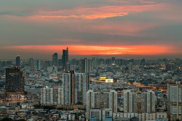 Bangkok, thailand - May 11, 2020 : Sky view of Bangkok with skyscrapers in the business district in Bangkok in the evening beautiful twilight give the city a modern style. Selective focus.