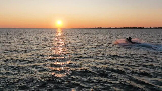 Water  scooter on the sea at sunset 1
