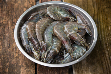 fresh raw shrimps in a bowl