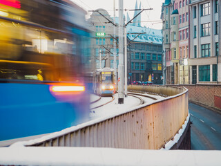 Modern tram in motion blur, city public transportation