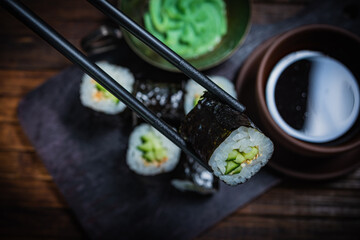 Fototapeta na wymiar Sushi- delicious asian. Fastfood- restaurant concept