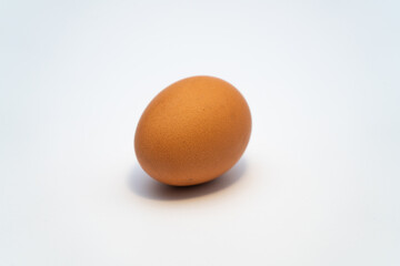 Installation of chicken eggs on a uniform background in different combinations. Diet healthy food
