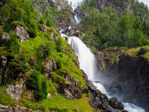 View on Langfossen waterfall in summer, Etne, Norway