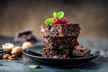 Brownie cake slices on a dark background