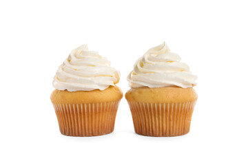 Delicious cupcakes decorated with cream on white background