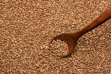 buckwheat and spoon. background, texture