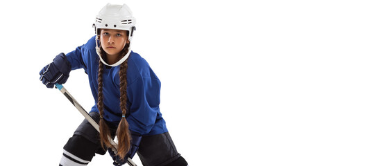 Cropped horizontal portrait of young female hockey player in blue uniform, with stick isolated over...