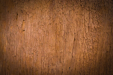 Old wood texture background with natural cracks. Dark brown wood plank is used for background.	