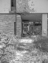 abandoned modern design house facade and garden